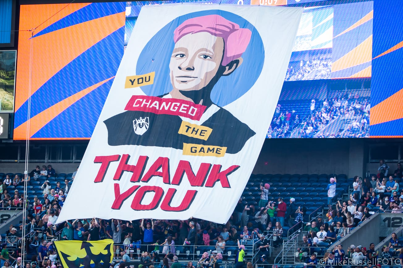 A large tifo celebrates Megan Rapinoe ahead of her last regular-season game for the Reign in 2023.