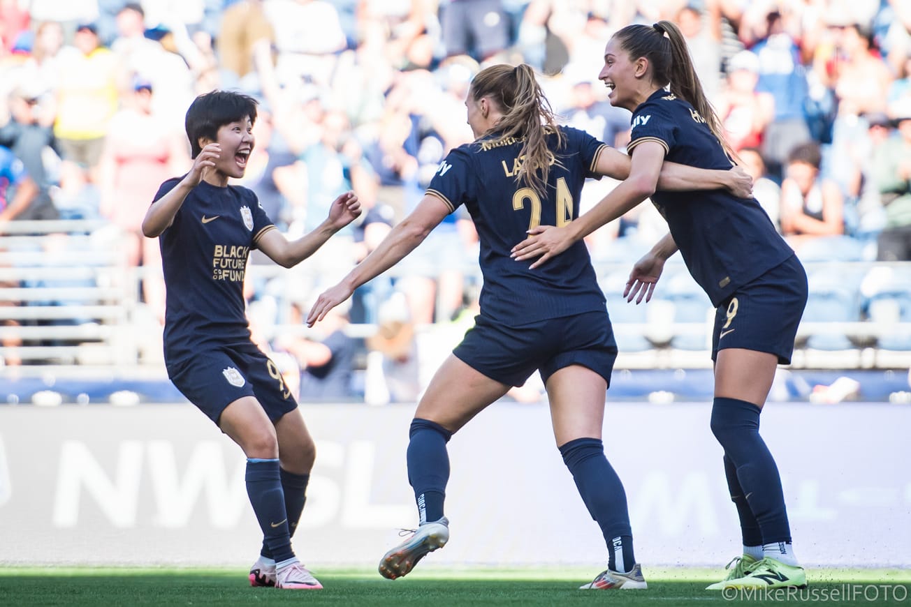 Veronica Latsko celebrates with Ji and Jordyn Huitema after scoring a goal against Utah Royals FC.