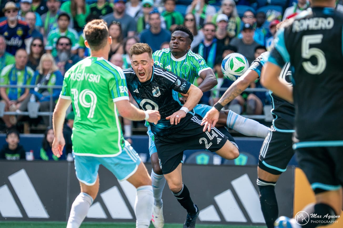 Danny Musovski looks on as Nouhou crashes into the back of Julian Gressel